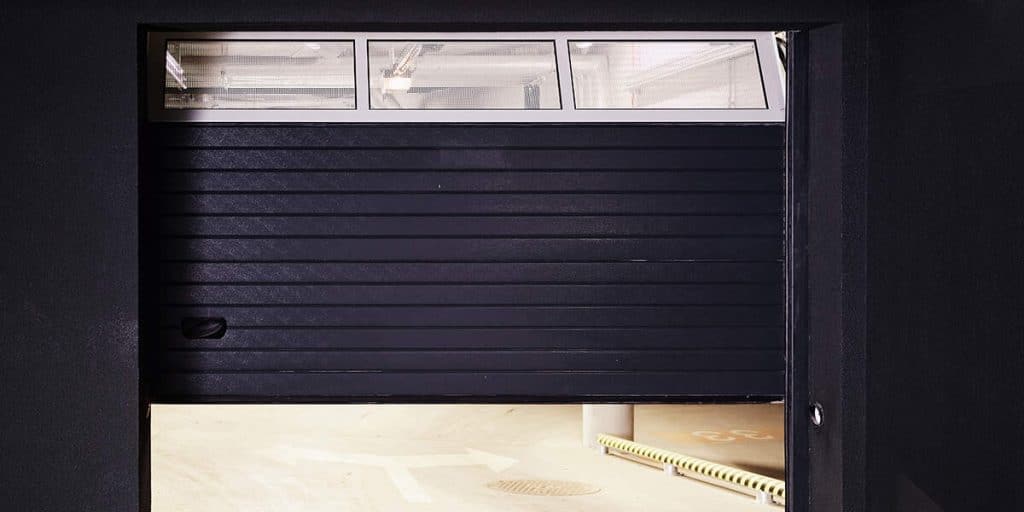 why is my garage door so loud