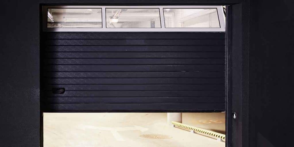 why is my garage door opening by itself